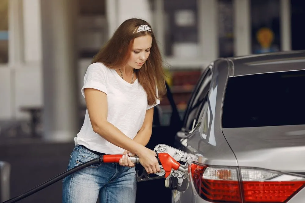 Driver receiving emergency fuel assistance for a vehicle
