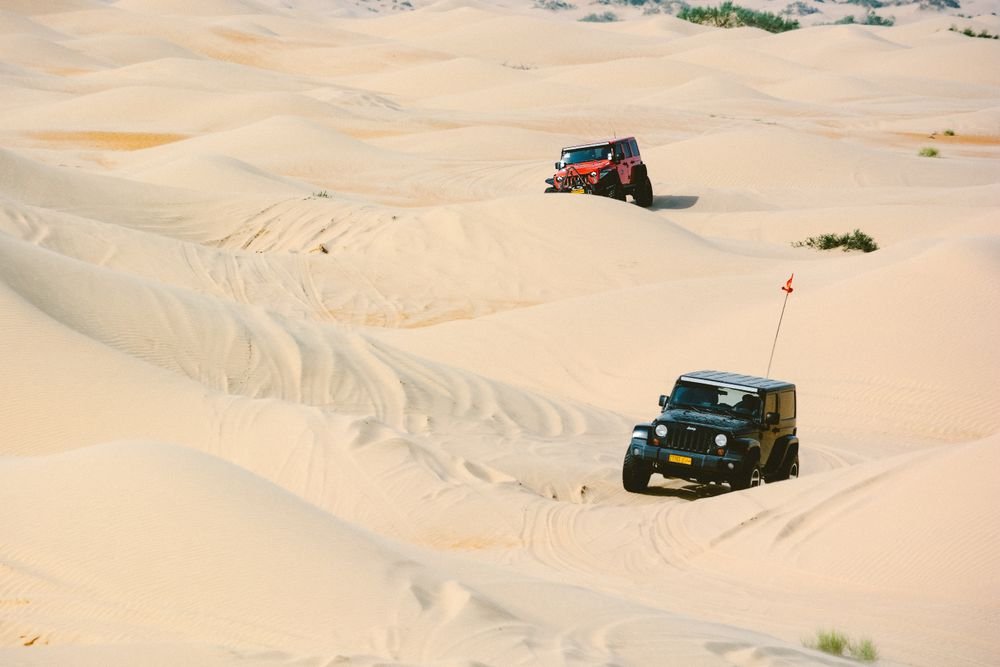 4x4 vehicle being recovered from sandy off-road terrain in the UAE